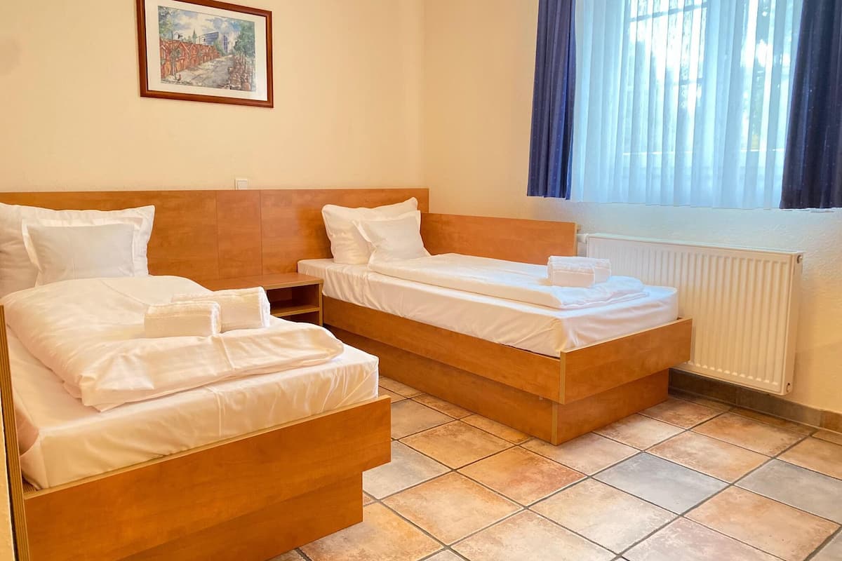 Twin Room | Down comforters, memory foam beds, in-room safe, desk