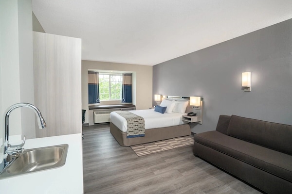 Blackout drapes, iron/ironing board, free WiFi, bed sheets