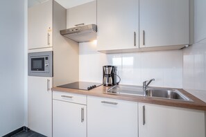 Fridge, microwave, dishwasher, coffee/tea maker