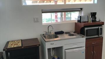 Fridge, microwave, stovetop, coffee/tea maker