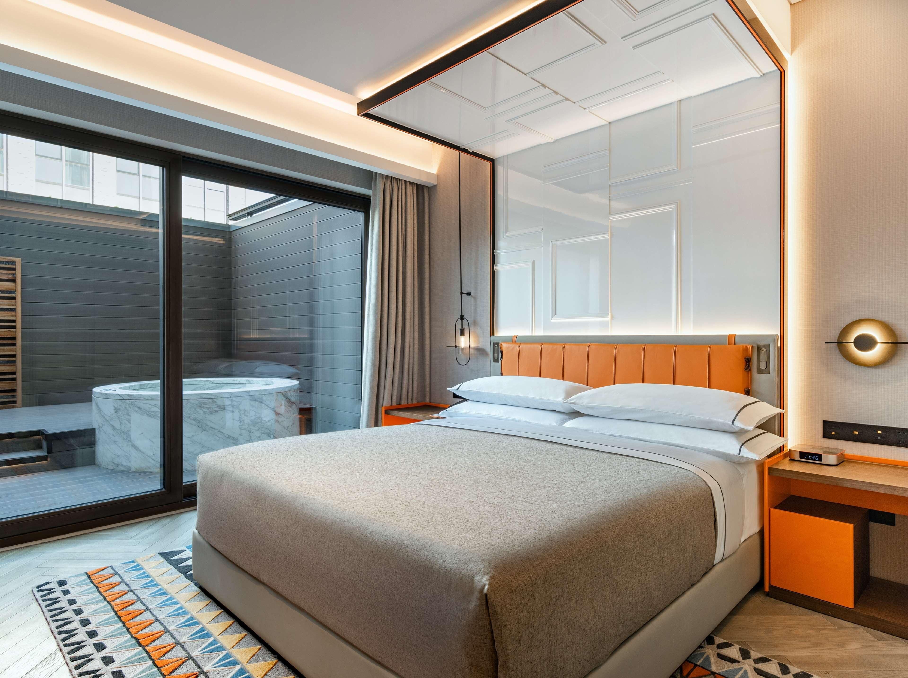 Premium bedding, down duvets, minibar, in-room safe