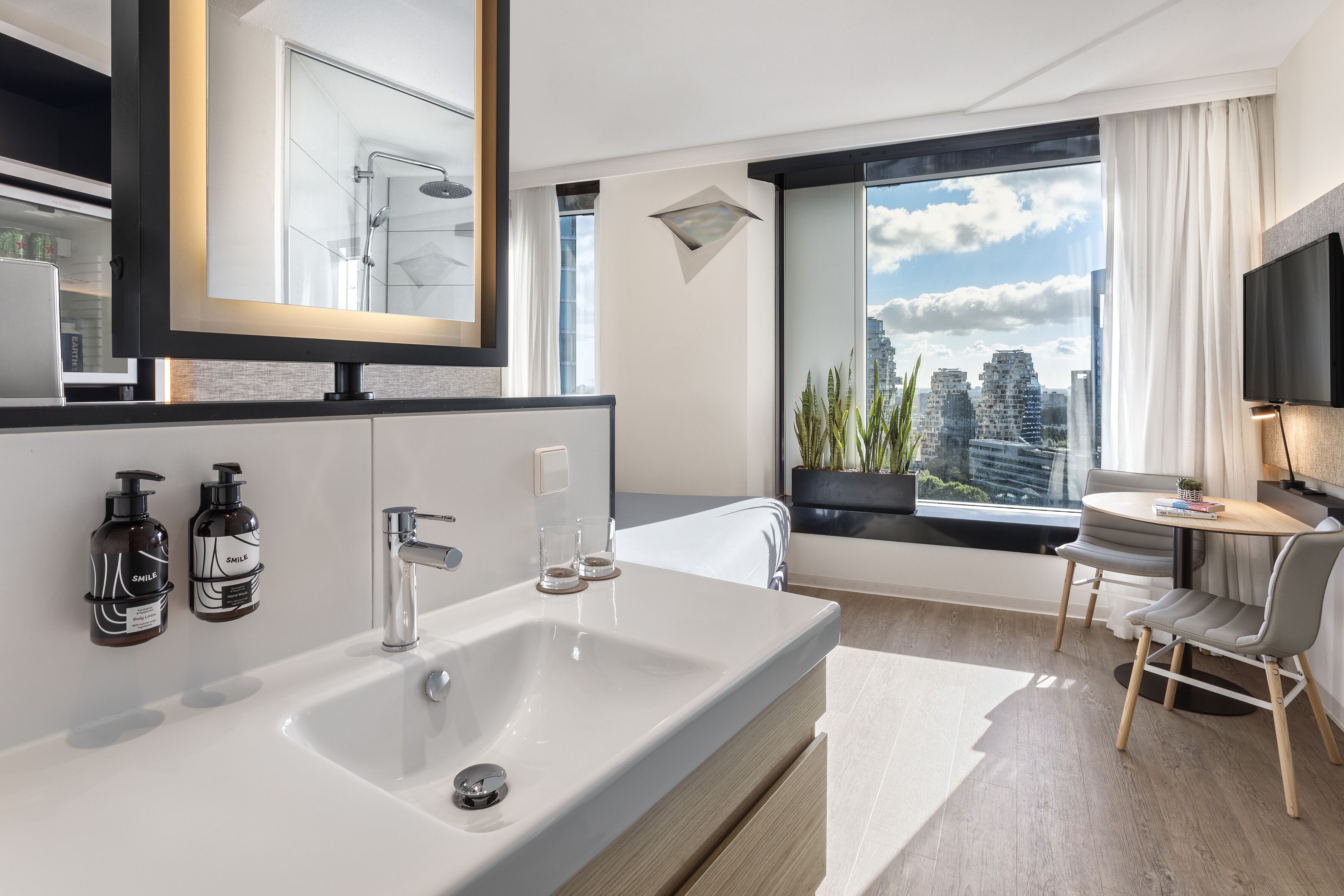 loft (the loft sky view) | bathroom | eco-friendly toiletries, hair dryer, towels, soap