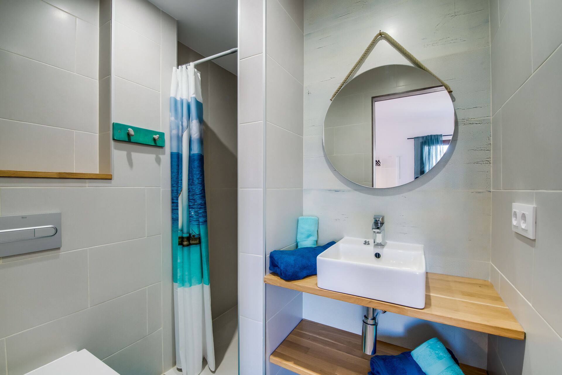 Shower, hair dryer, towels, toilet paper