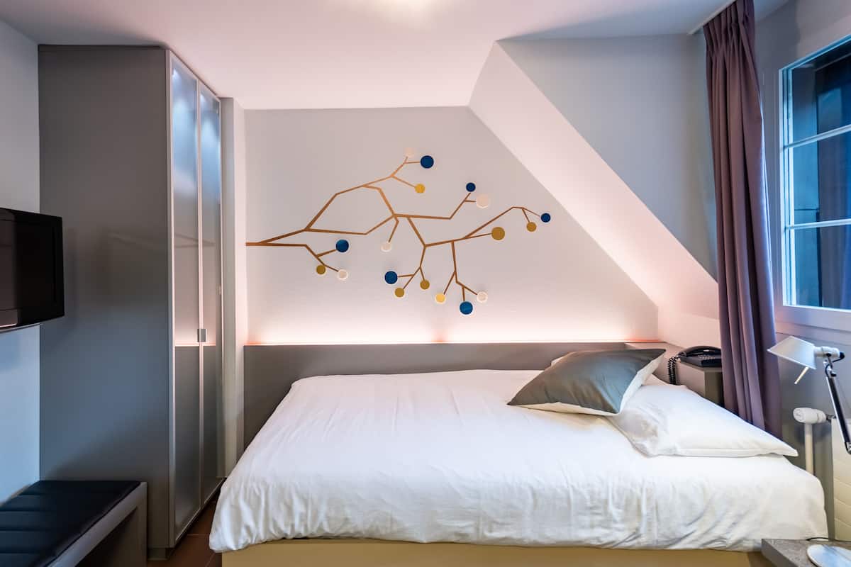 Chambre simple | Literie hypoallergénique, minibar, coffre-fort pour ordinateur portable