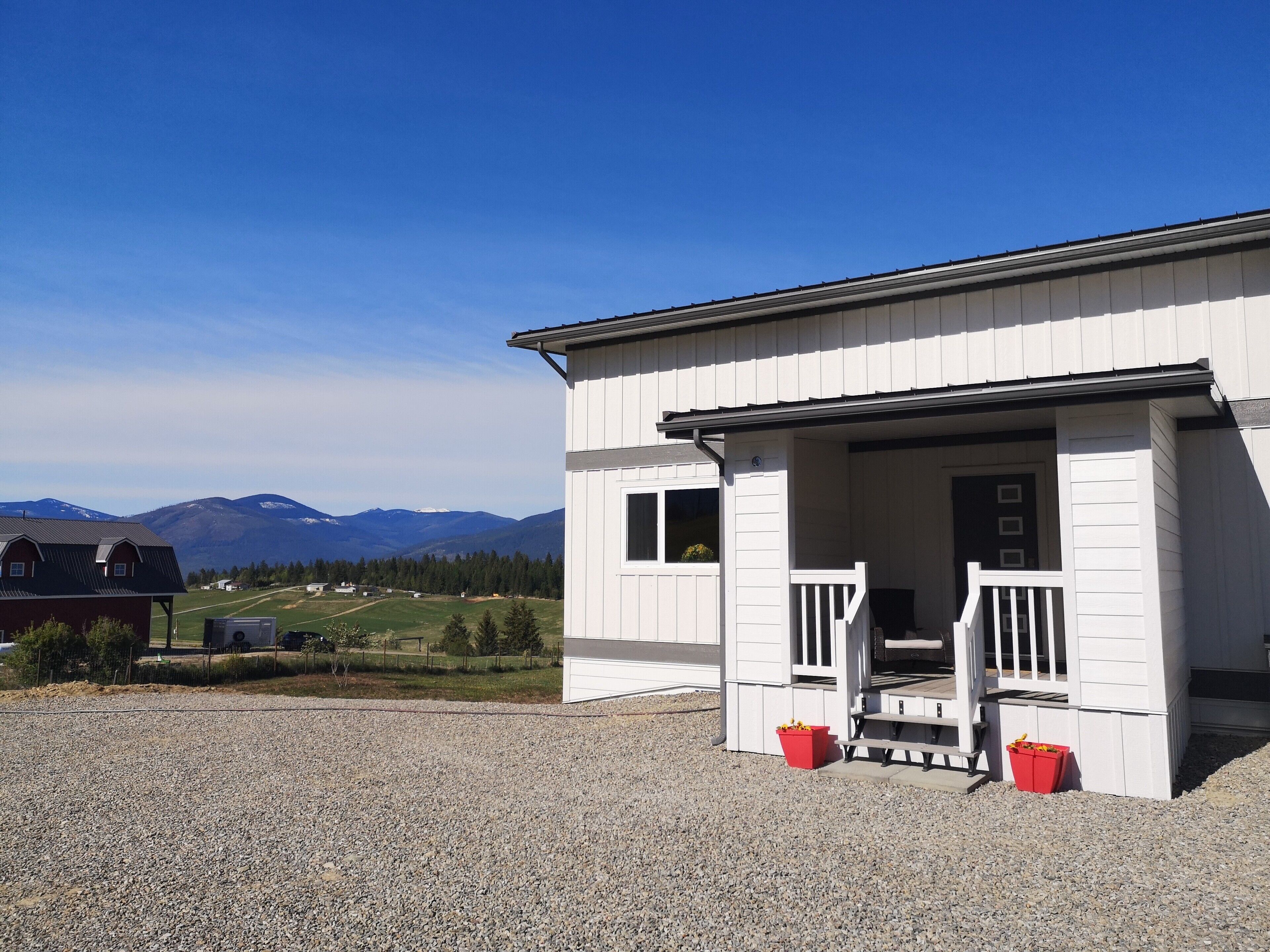 covered entrance for the 2 guest suites in the back of the house
