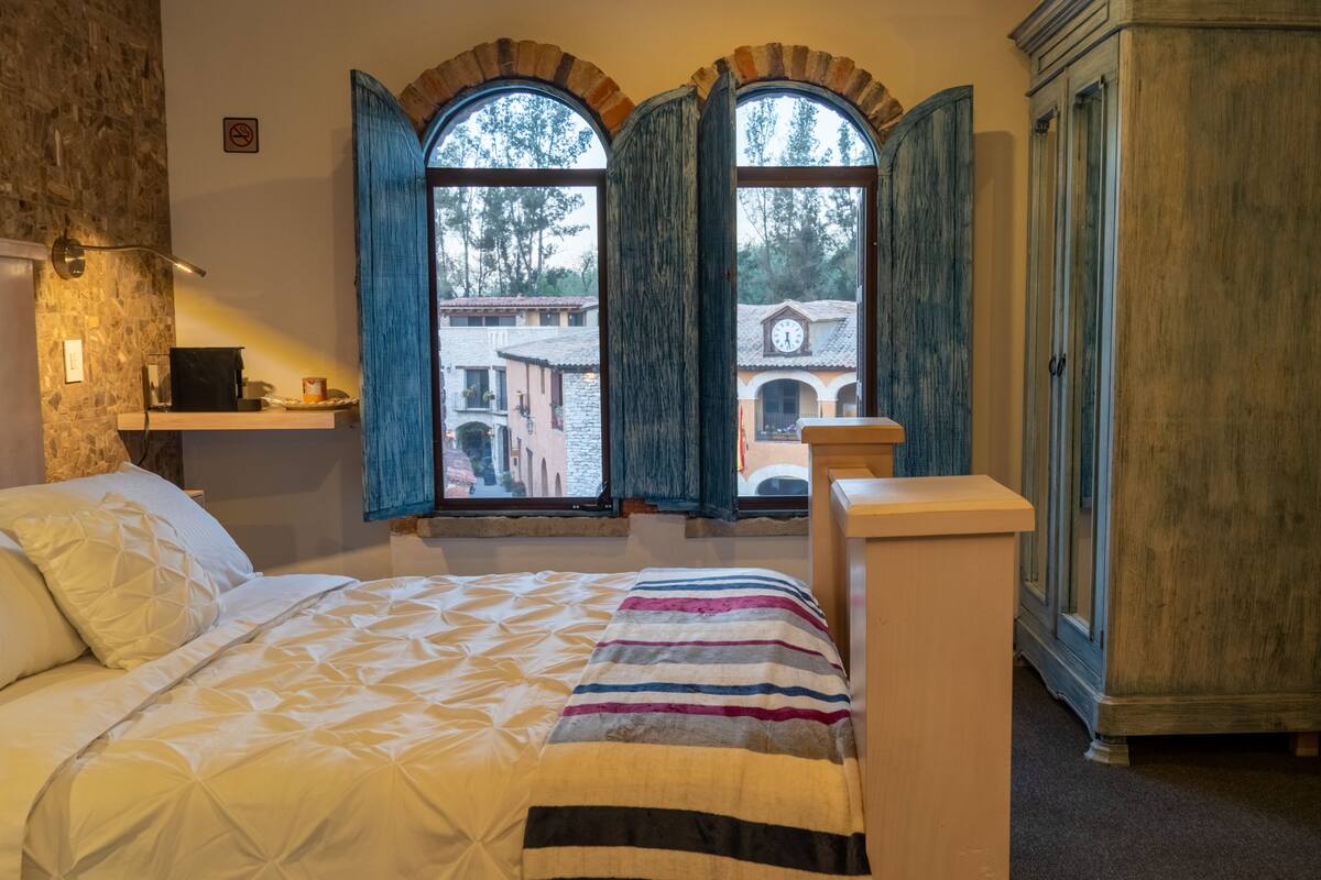 Habitación junior | Ropa de cama de alta calidad y edredones de plumas