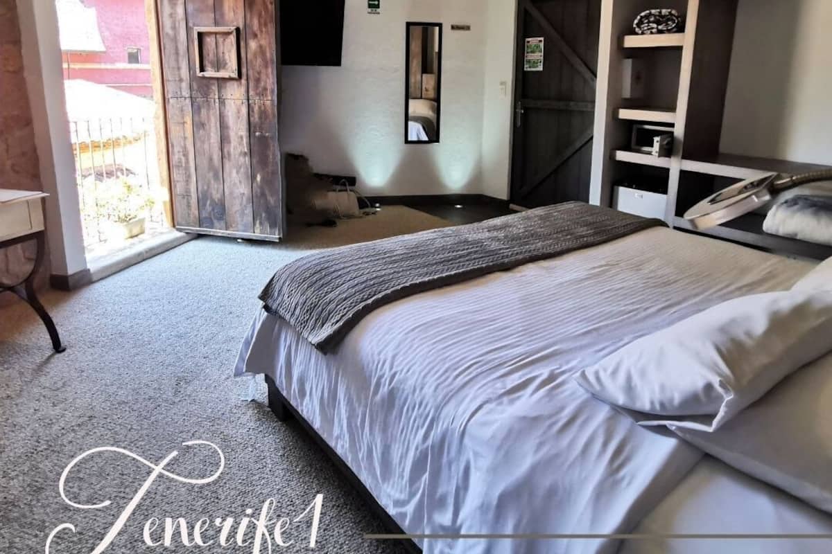 City kamer | 1 slaapkamer, luxe beddengoed, donzen dekbedden, pillowtop-bedden
