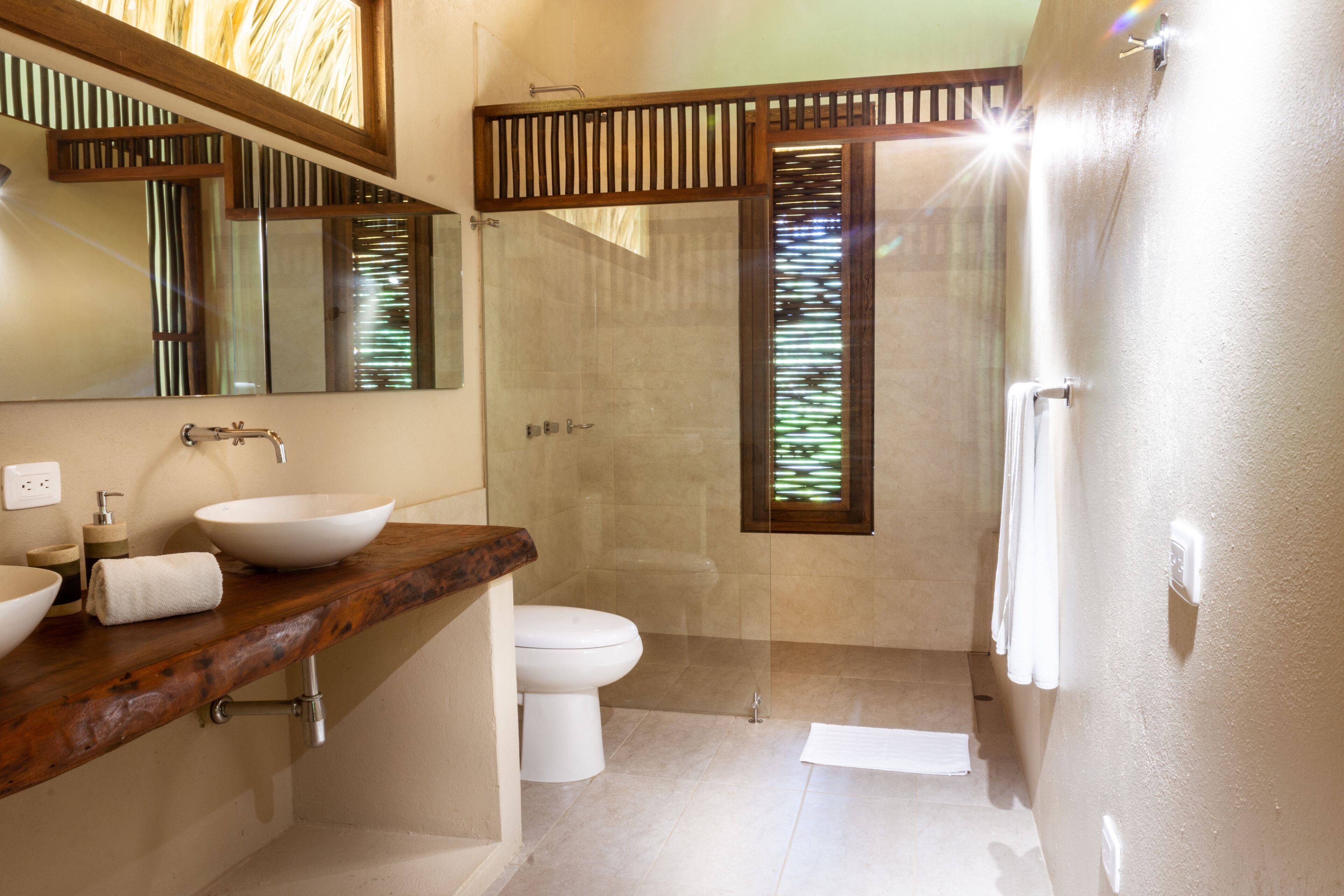 shower, rainfall showerhead, designer toiletries, towels