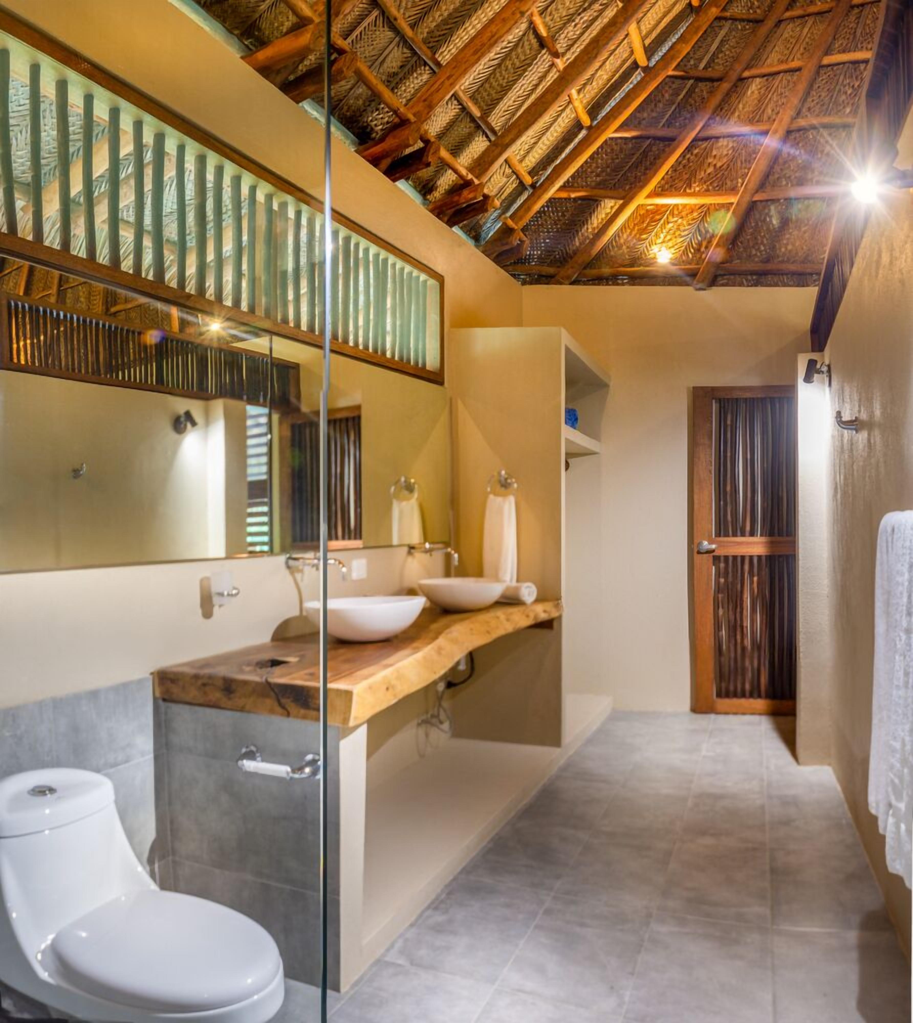 family cabin | bathroom | shower, rainfall showerhead, designer toiletries, towels