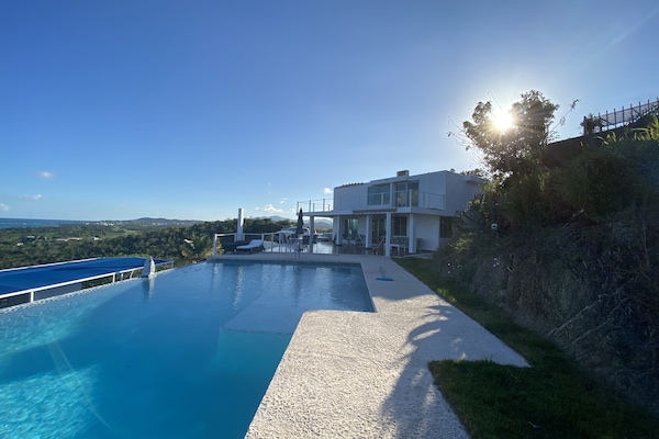 Sun begins to set over the Golden Mountains behind Casablanca Retreat