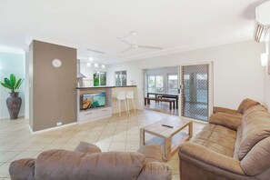 TV, fireplace, offices - Official Lakes Resort Three Bedrooms Apartments (Cairns North)