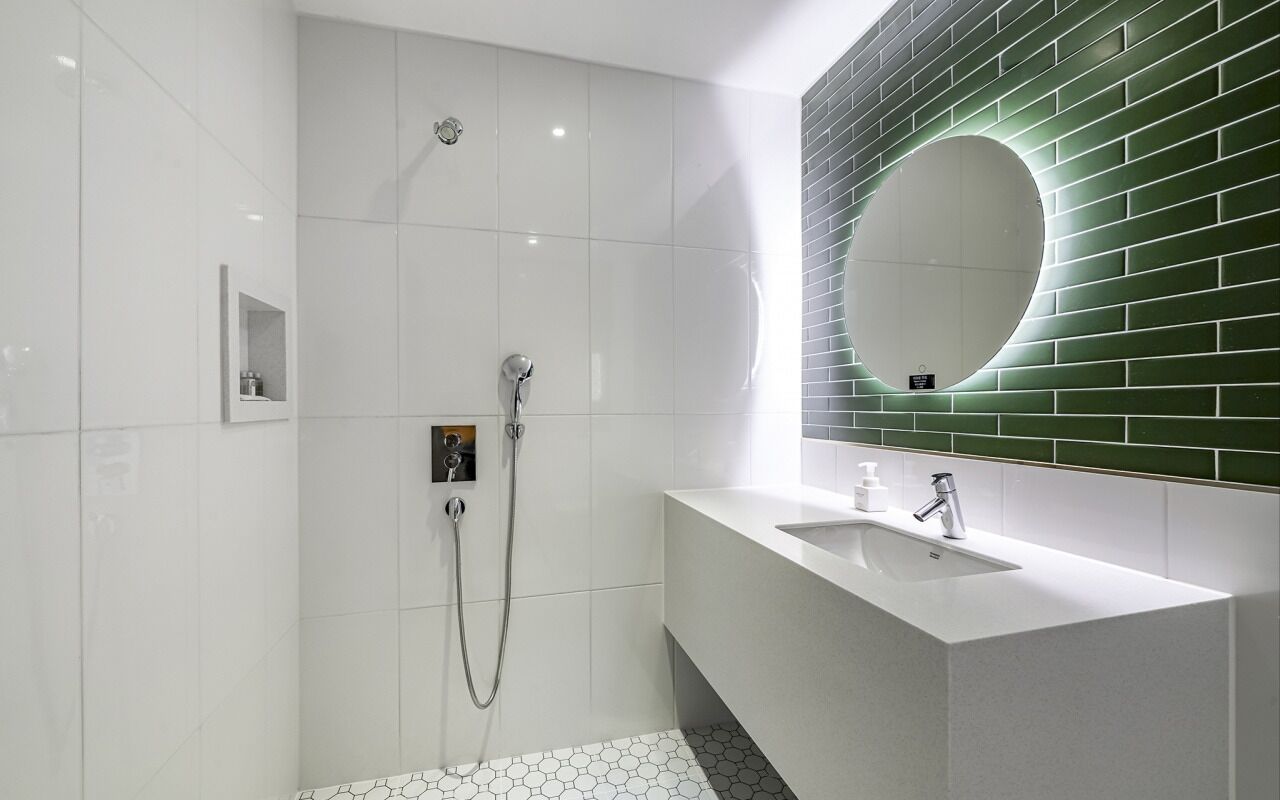 Deluxe Twin Room (Netflix) | Bathroom | Designer toiletries, hair dryer, bathrobes, slippers