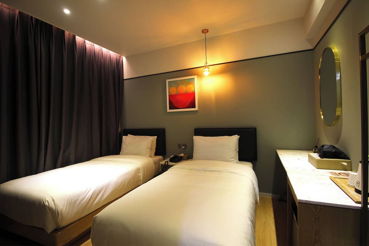 Premium bedding, down duvets, desk, laptop workspace