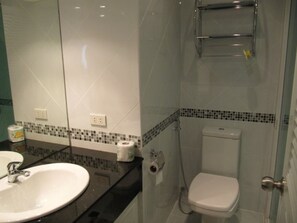 A bathroom with a white sink, a toilet, and a shower area. - Jomtien Beach Condominium Jbc A3 Floor 12 Room 2728 (Pattaya)