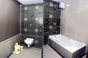 Shower, free toiletries, slippers, towels