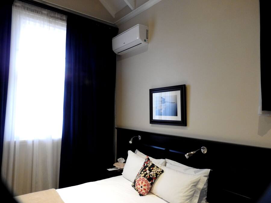 Desk, laptop workspace, blackout curtains, free WiFi