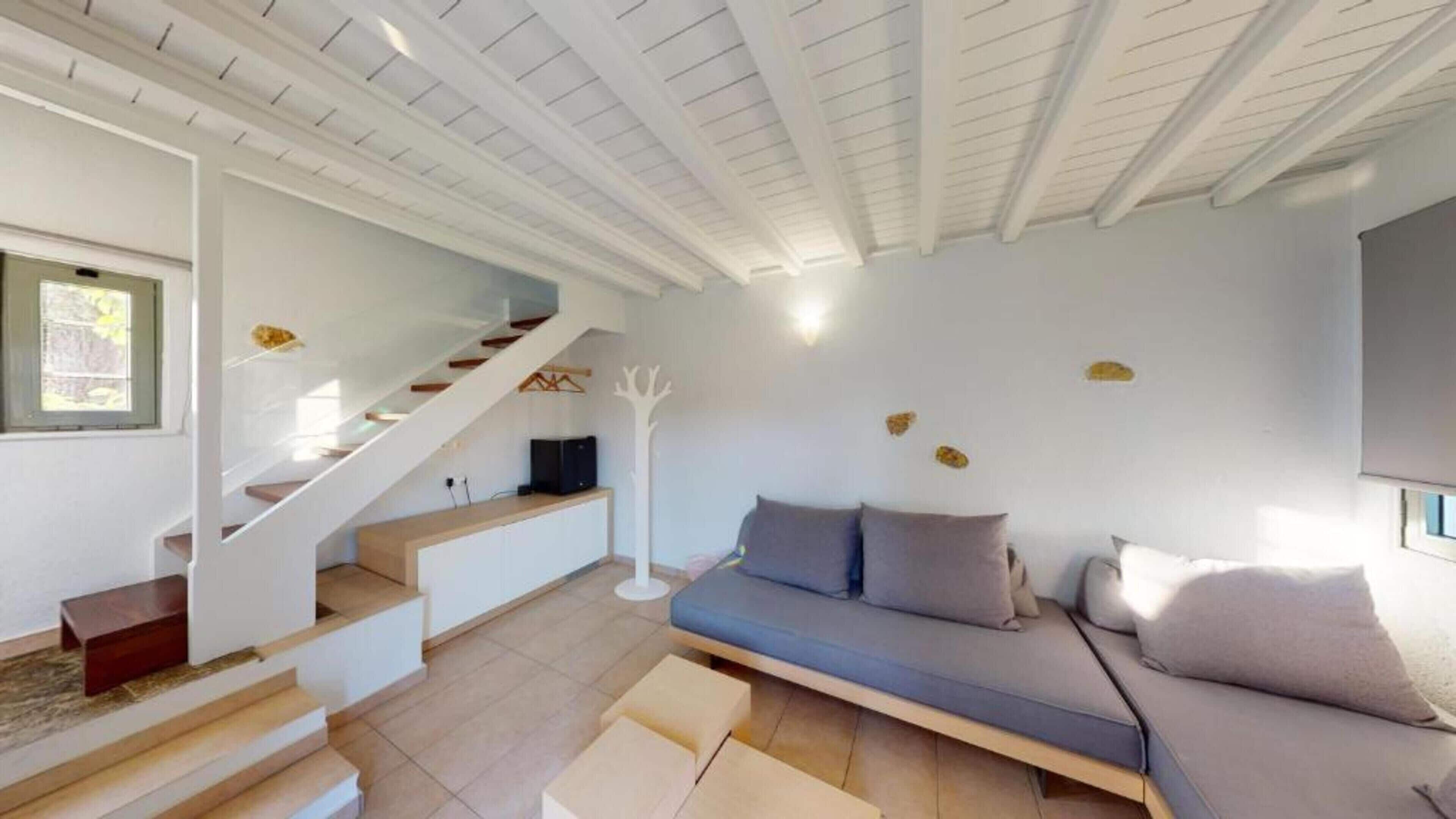 Executive Suite, 2 Bedrooms, Garden View, Garden Area | In-room safe, individually decorated, desk, blackout drapes