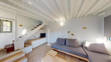 Executive Suite, 2 Bedrooms, Garden View, Garden Area | In-room safe, individually decorated, desk, blackout drapes