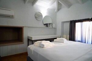 Junior Suite, 2 Bedrooms, Pool View, Poolside | In-room safe, individually decorated, desk, blackout drapes