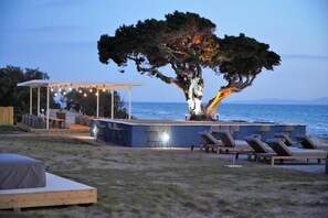 Deluxe Room, 1 Bedroom, Sea View, Beachfront | In-room safe, individually decorated, desk, blackout drapes
