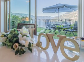 Panoramic Apartment, Lake View | Living area | 37-inch Smart TV with satellite channels, TV, Netflix