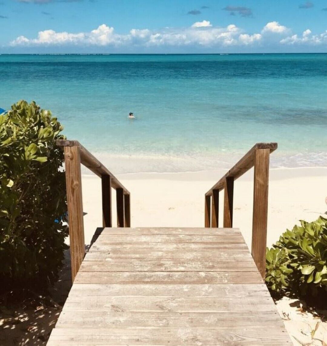 On the beach, sun-loungers, beach towels