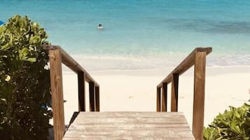 On the beach, sun-loungers, beach towels
