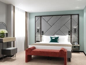 Suite | Een kluis op de kamer, een bureau, geluiddichte muren, gratis wifi