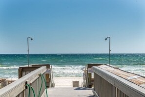 Walk along the oceanfront boardwalk, offering a serene view of the waves.