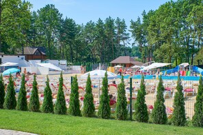 Indoor pool, seasonal outdoor pool, pool umbrellas, sun loungers