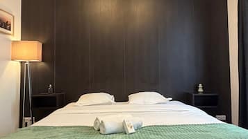 Fer et planche à repasser, draps fournis