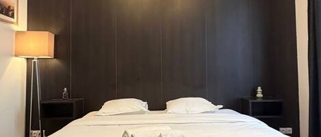 Fer et planche Ă repasser, literie fournie