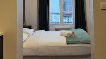 Fer et planche Ă repasser, draps fournis