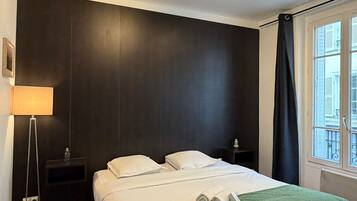 Fer et planche à repasser, draps fournis