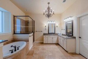 Combined shower/tub, hair dryer, towels, soap
