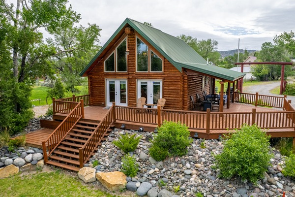 Log cabin next to river