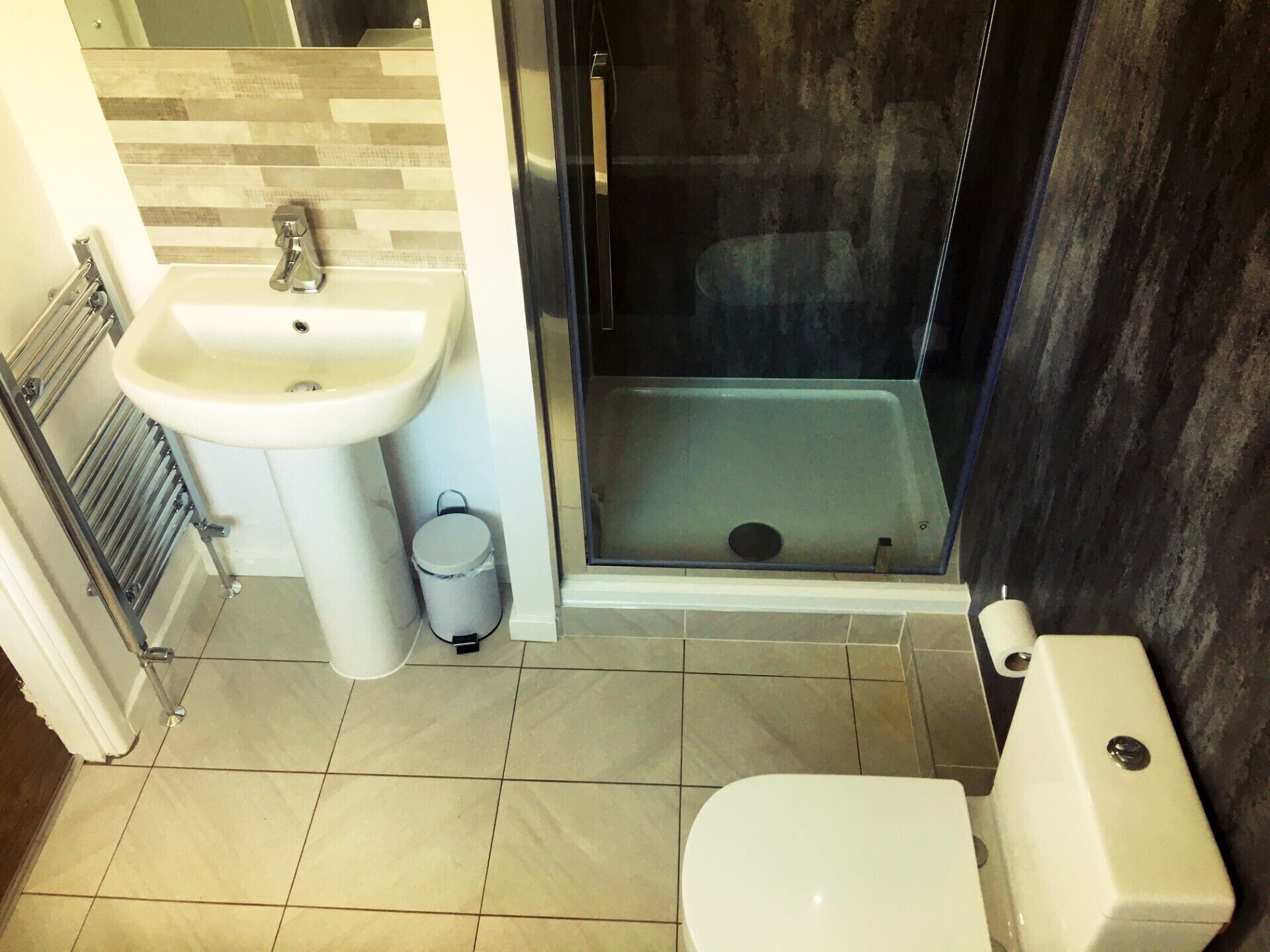 Bathtub, hair dryer, towels, soap