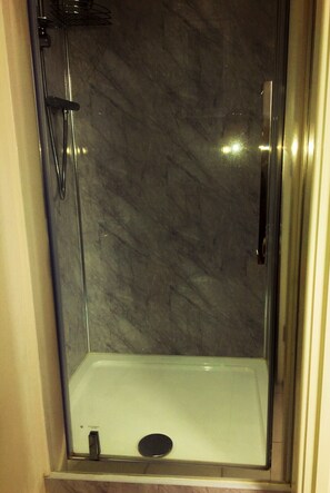 Bathtub, hair dryer, towels, soap