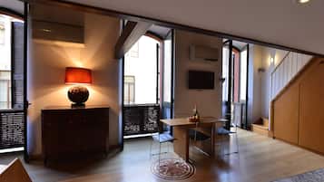 Apartment | Living area | 49-inch flat-screen TV with cable channels, TV