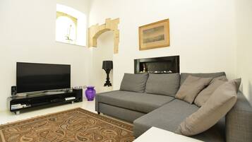 Apartment | Living area | 49-inch flat-screen TV with cable channels, TV