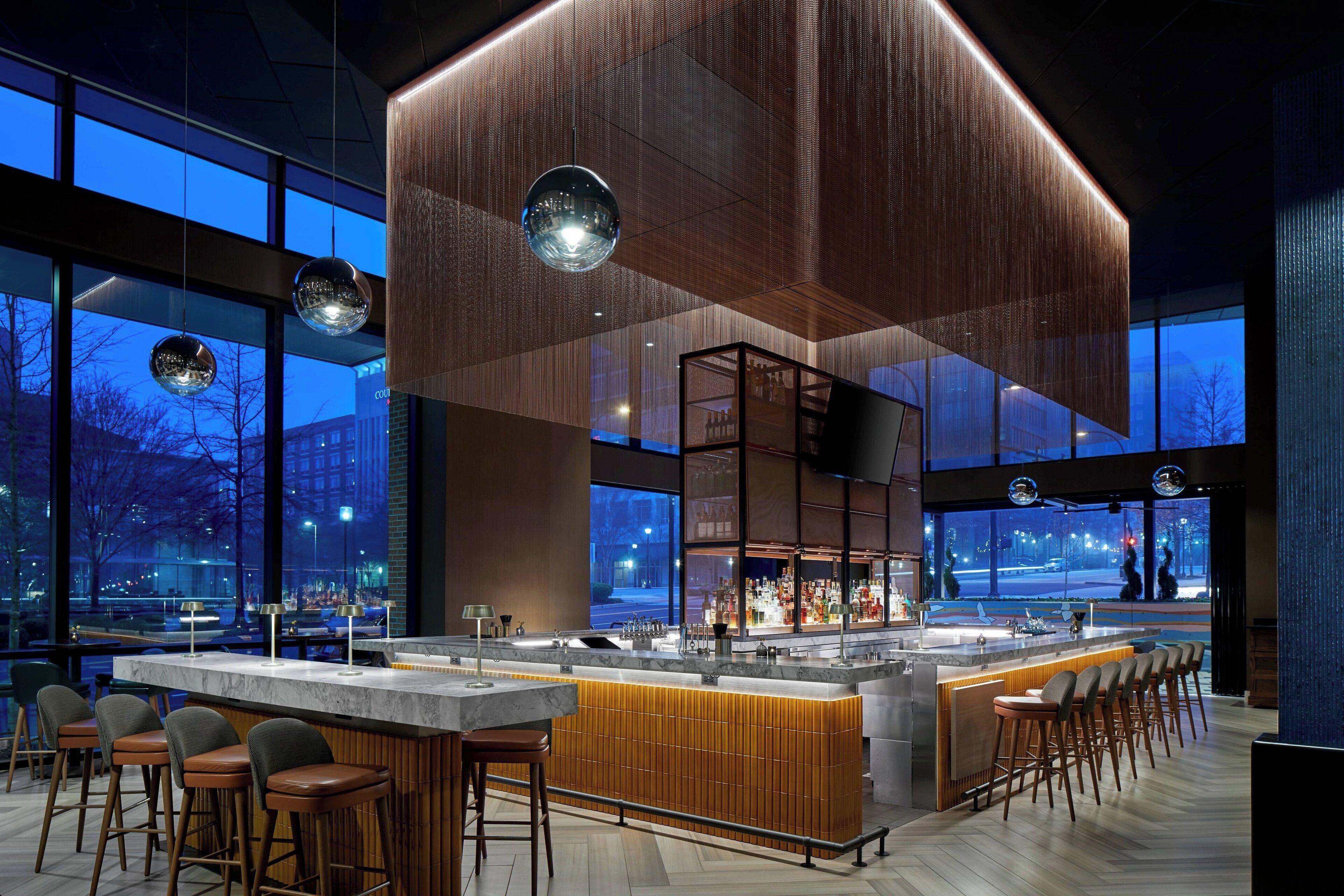 2 bars/lounges, rooftop bar, tapas bar