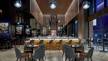 2 bars/lounges, rooftop bar, tapas bar