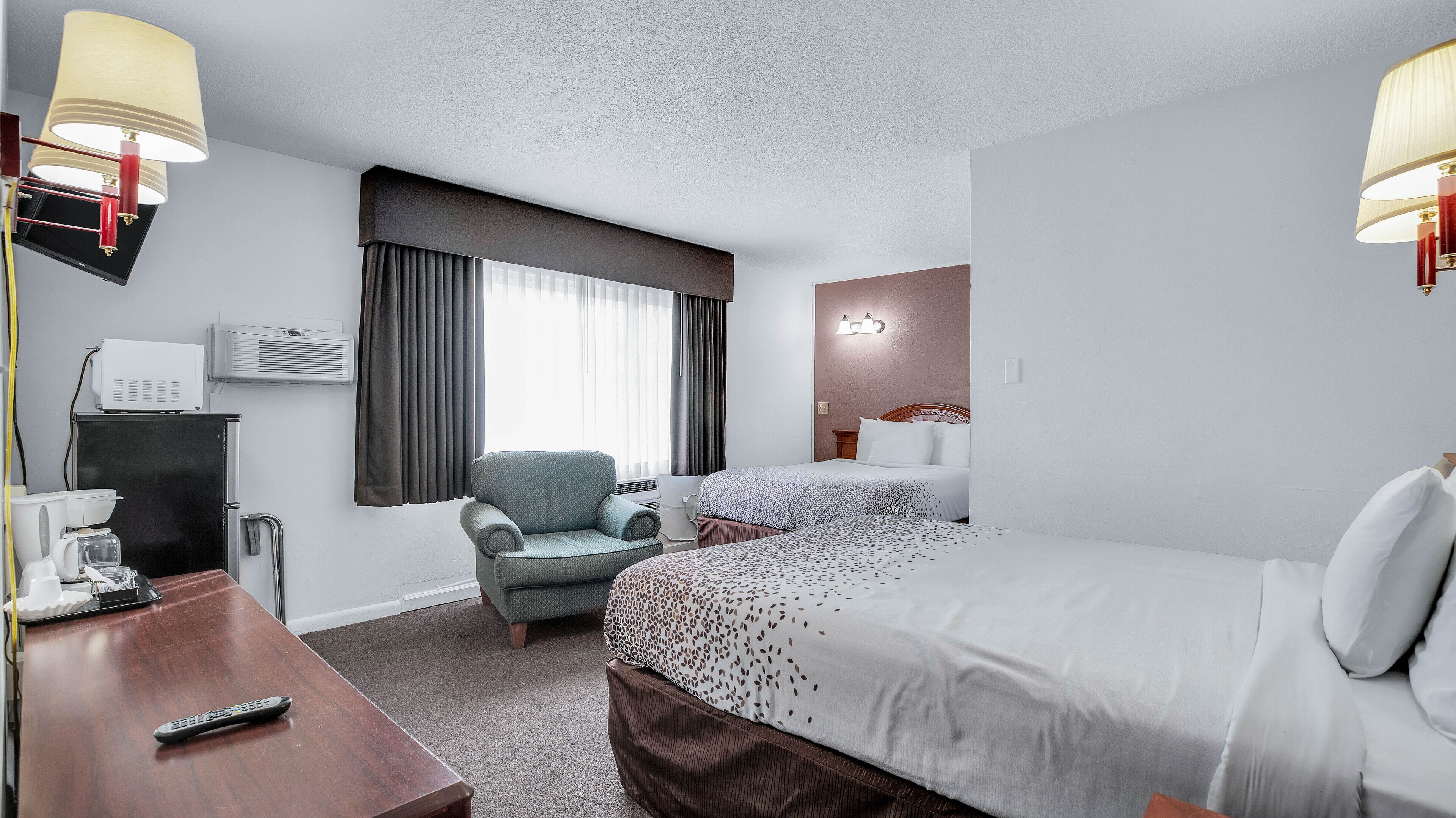 Standard Room, 2 Queen Beds, Non Smoking | Desk, laptop workspace, blackout curtains, iron/ironing board