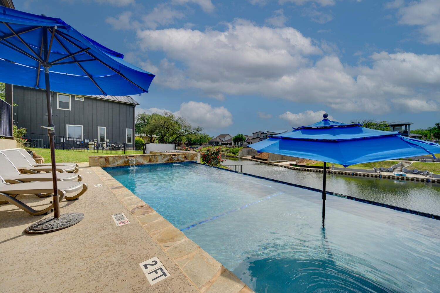  Highly rated home with private pool, hot tub and 90 feet of waterfront!