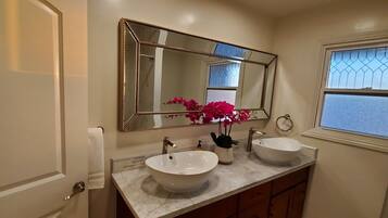 Hair dryer, towels, soap, shampoo