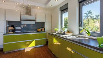 Villa | Private kitchen | Fridge, microwave, oven, stovetop