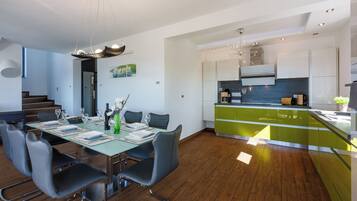 Villa | Private kitchen | Fridge, microwave, oven, stovetop