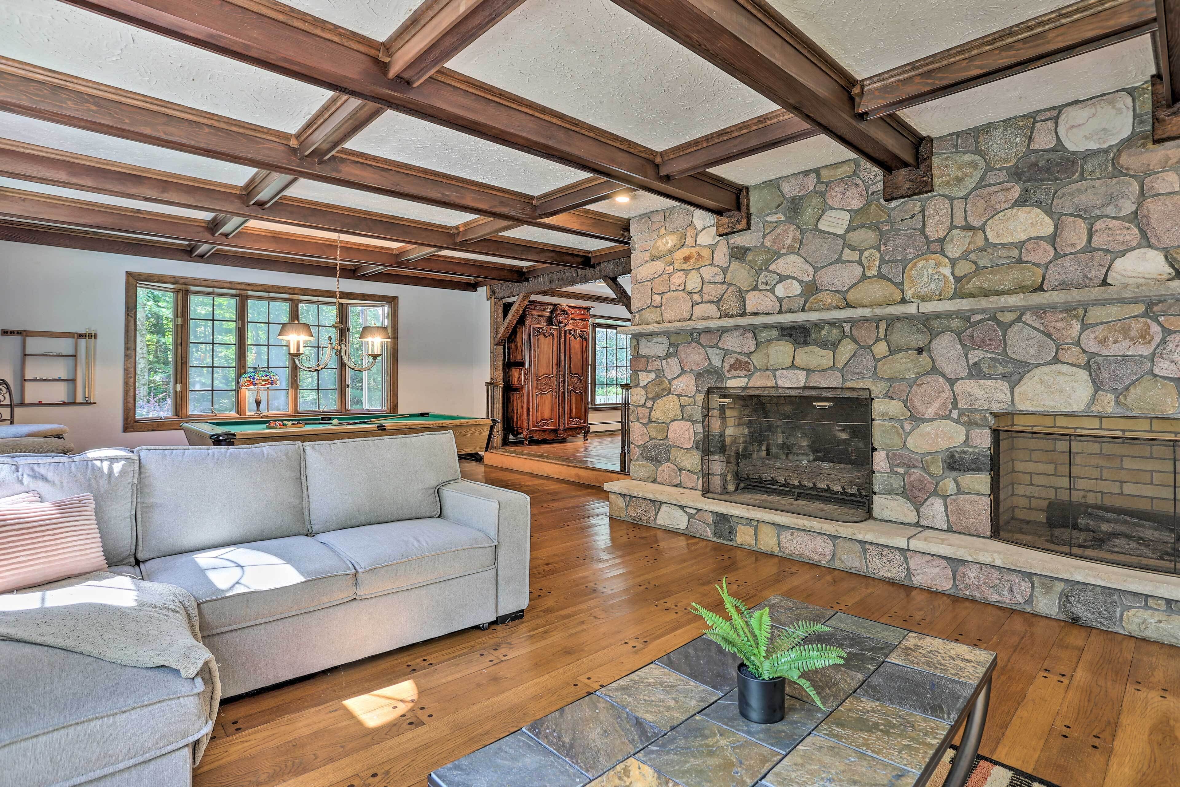 TV, fireplace, books