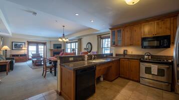 Condo, 2 Bedrooms | Private kitchen | Fridge, oven, coffee/tea maker, toaster