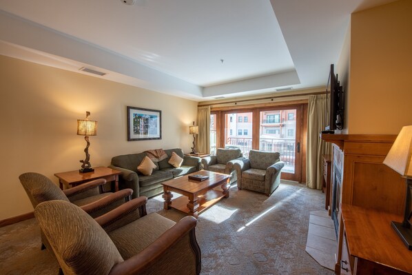 Condo, 2 Bedrooms | Living area | 42-inch TV with cable channels